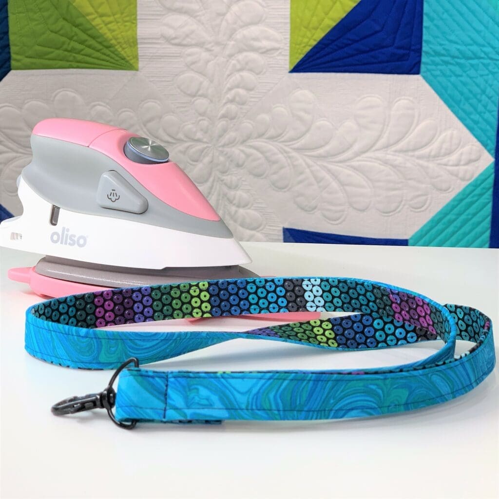 Pink iron and blue patterned lanyard