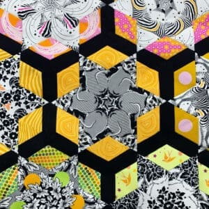 Geometric hexagonal cubes with colorful floral designs