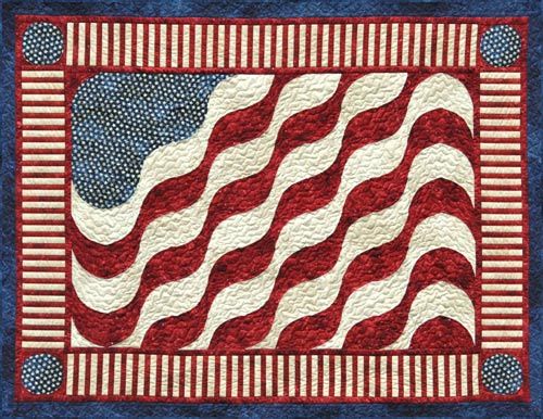 A quilt with an american flag design on it.