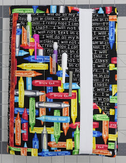 Crayon-patterned pencil pouch with repeating text