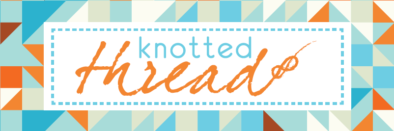 A blue and white banner with the words knotted read written in orange.