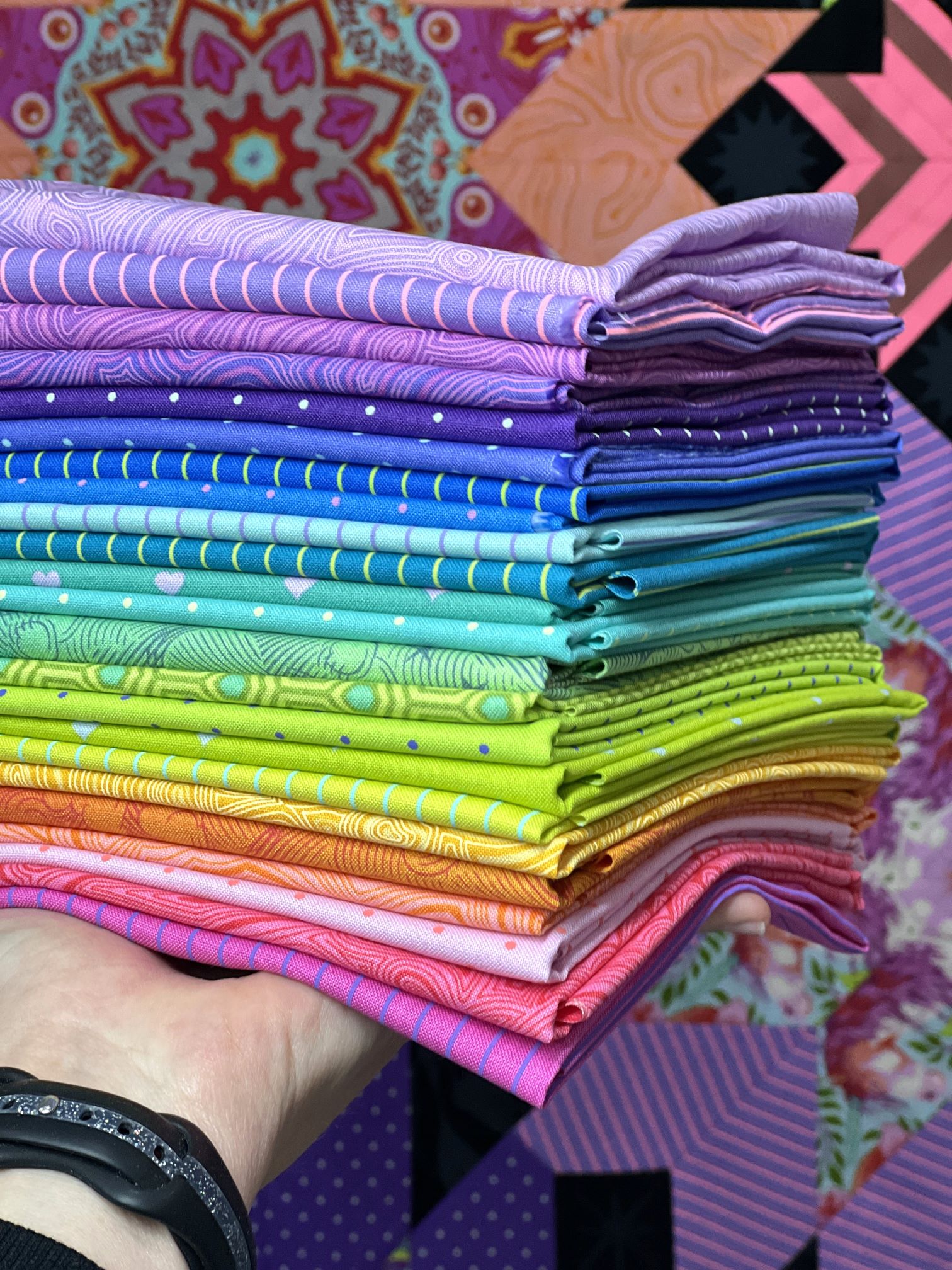 A stack of colorful fabric is shown.