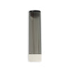 A black and white tube of liquid on top of a table.