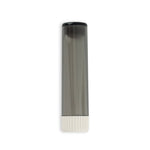 A black and white tube of liquid on top of a table.