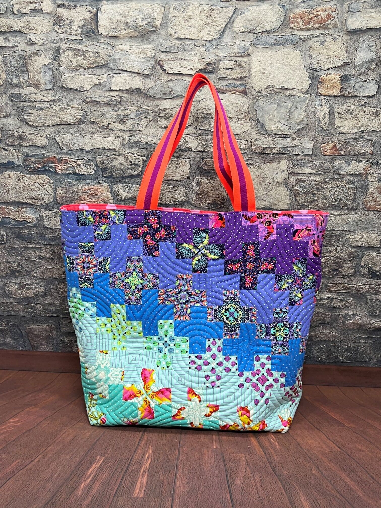 A colorful bag with a pattern of crosses.