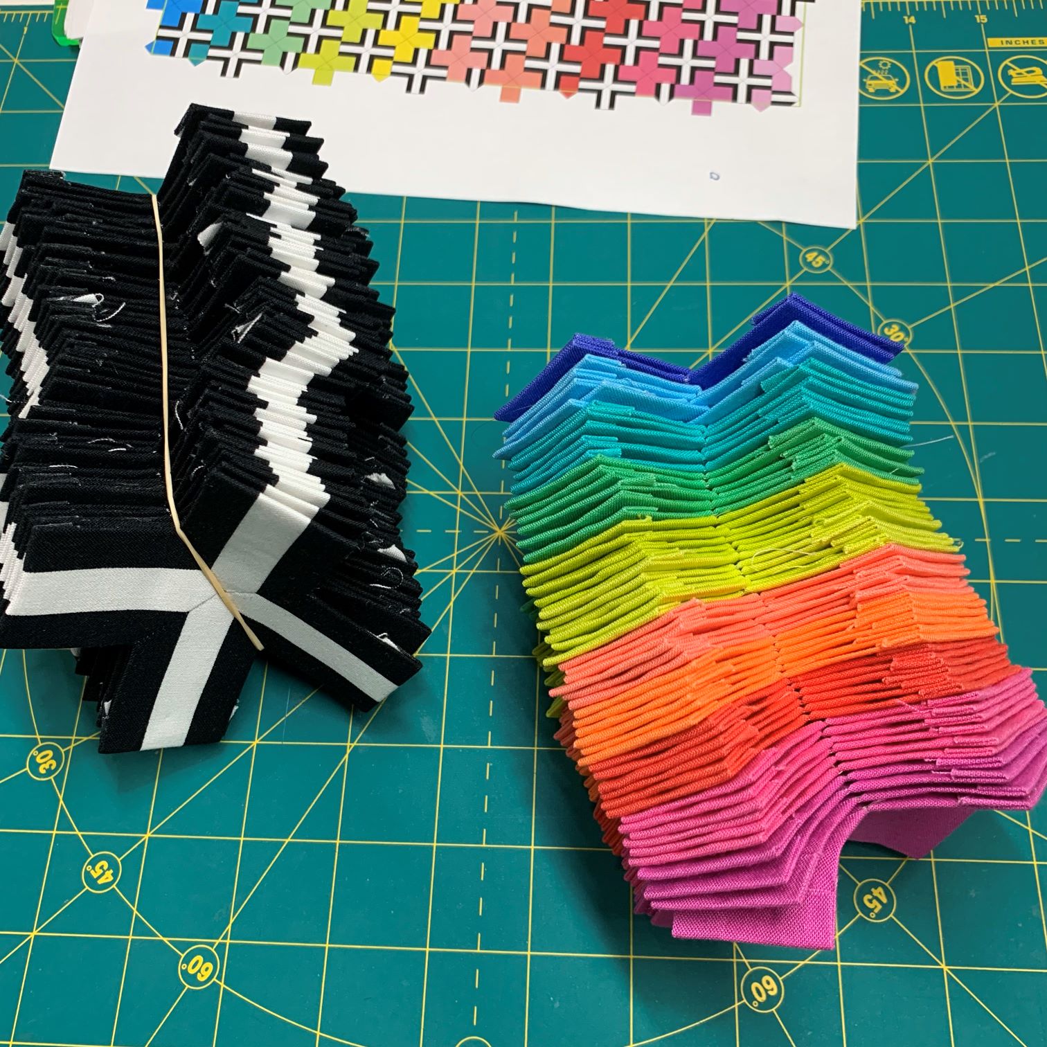 A table with a bunch of paper strips on it