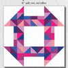 A quilt with a geometric design in pink and blue.