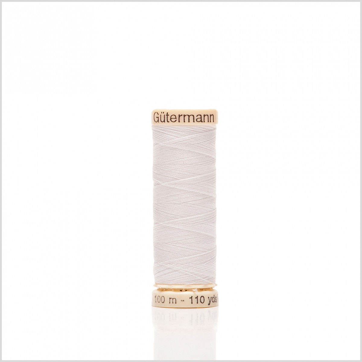 A spool of thread with white background.