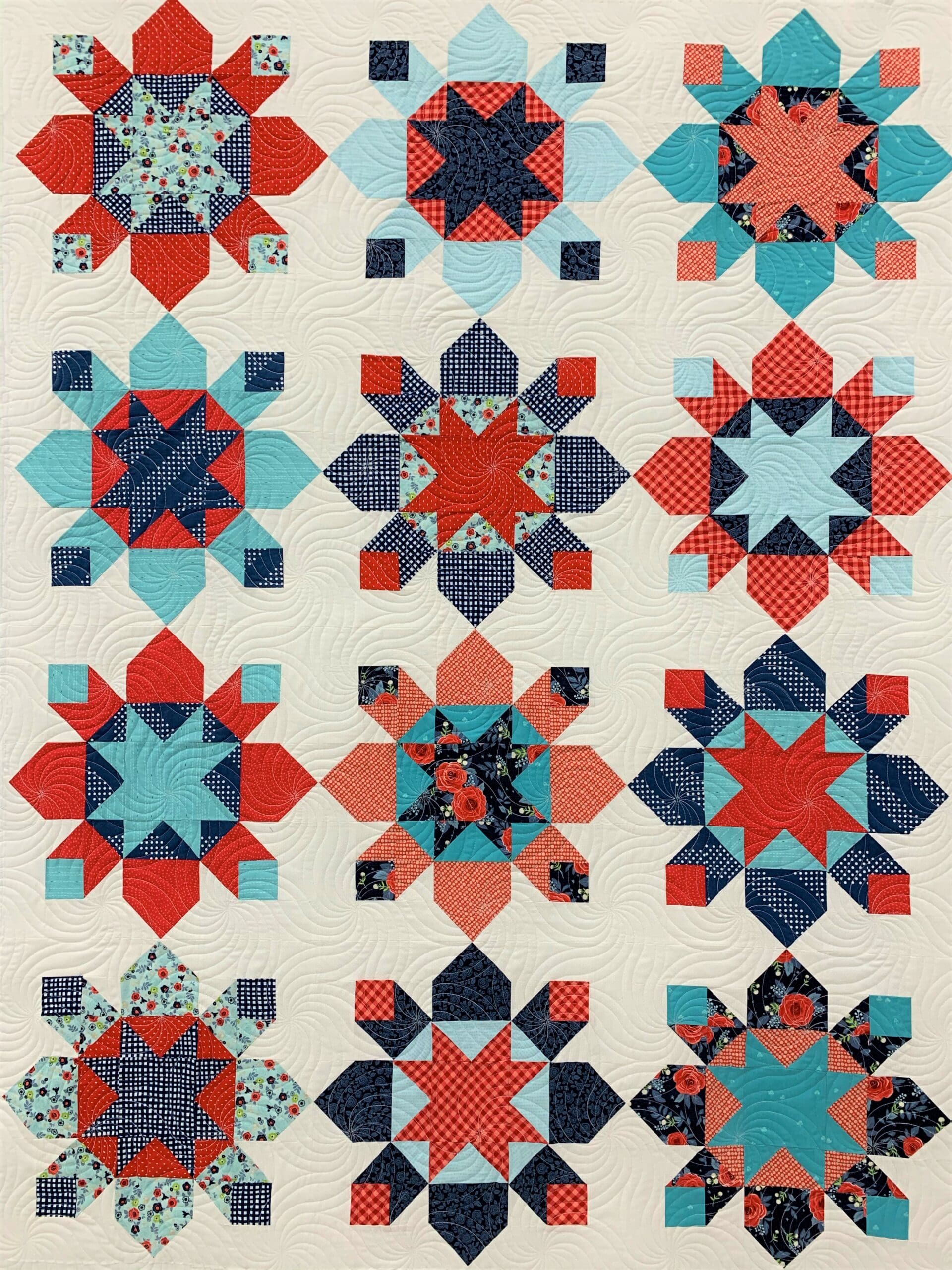 A quilt with different colored stars on it.