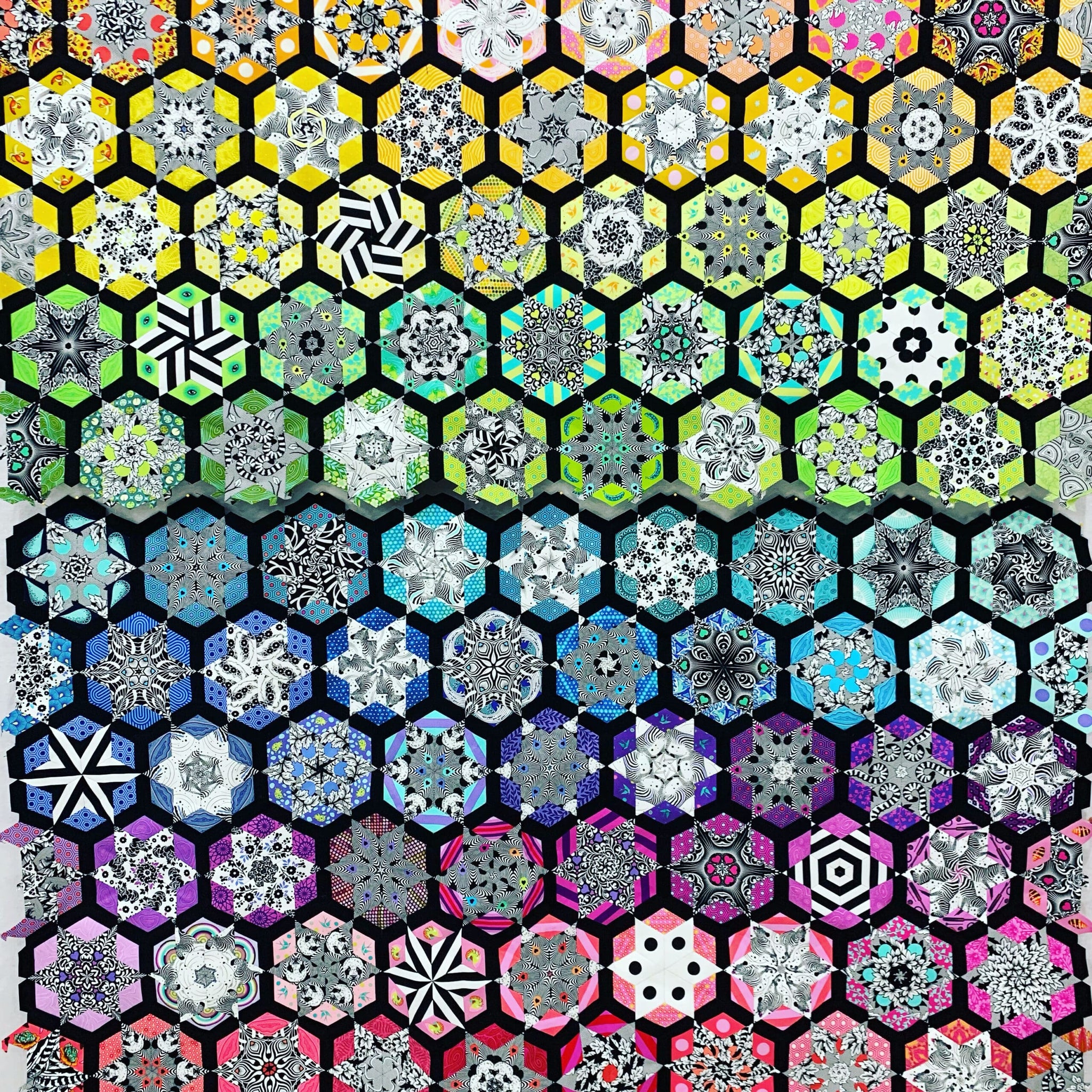 A series of hexagons with different colors and designs.