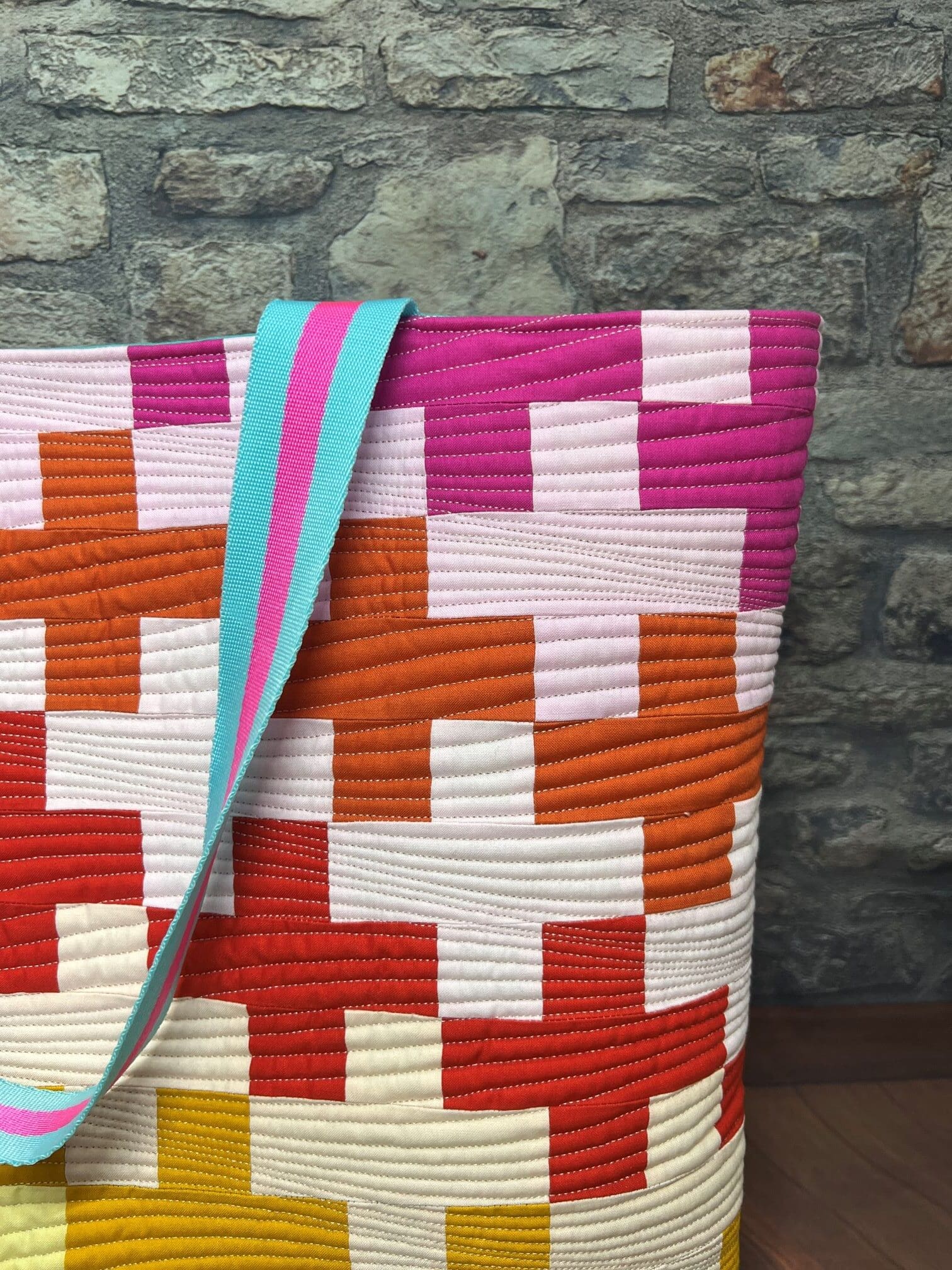 A close up of the handle of a bag
