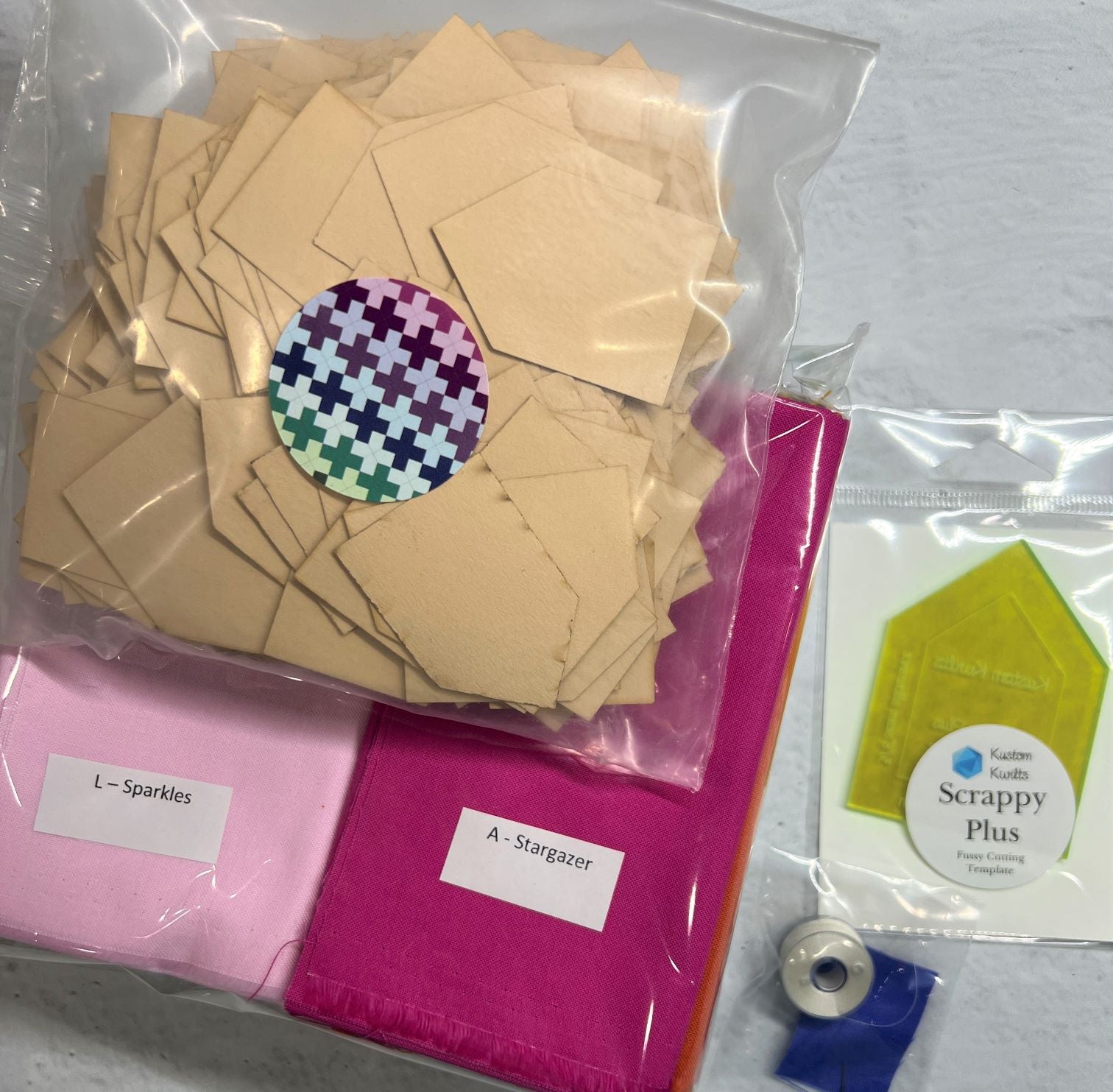 A bag of paper and some stickers on top of it