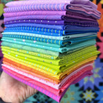 A stack of colorful fabric is shown.