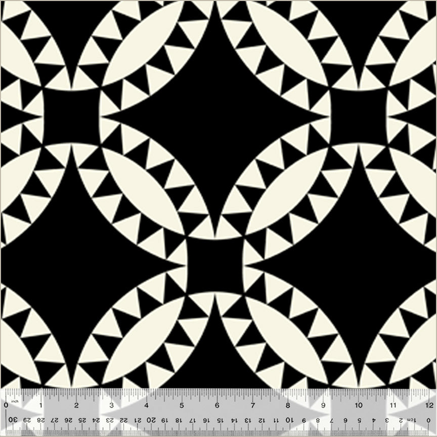 Black and white geometric pattern with a ruler for scale.