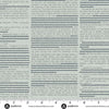 Close-up of printed text with a ruler at the bottom for scale.