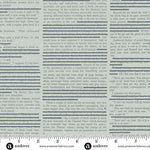 Close-up of printed text with a ruler at the bottom for scale.