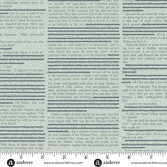Close-up of printed text with a ruler at the bottom for scale.