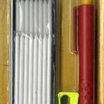 A box of candles and matches in it.