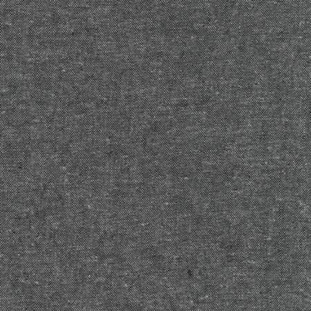 A gray fabric with some white dots on it
