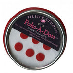 A tin of red polka dots with the lid open.