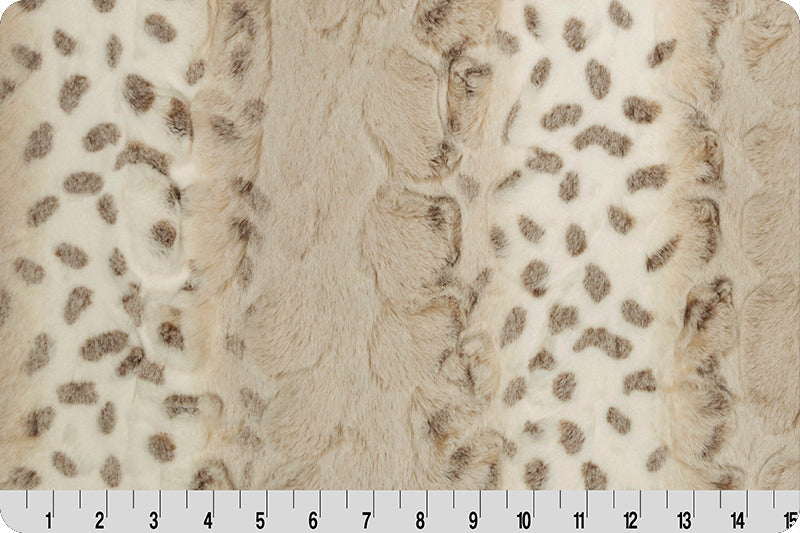 A close up of the fabric for a blanket