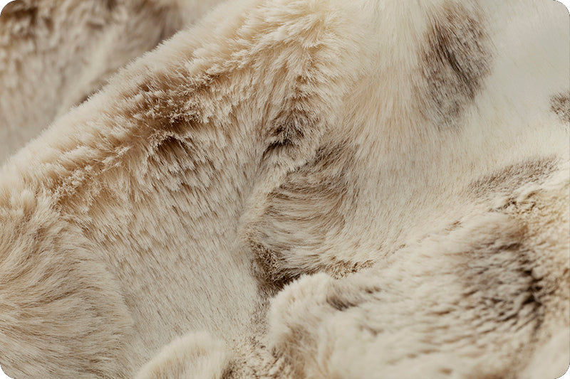 A close up of the fur on a white background