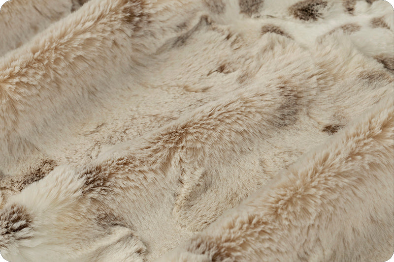 A close up of the fur on a blanket