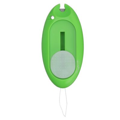 A green key fob with a white button.