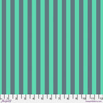 A green and grey striped fabric background.