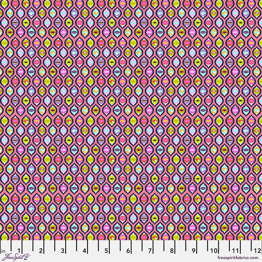 A pink and yellow pattern with many circles.