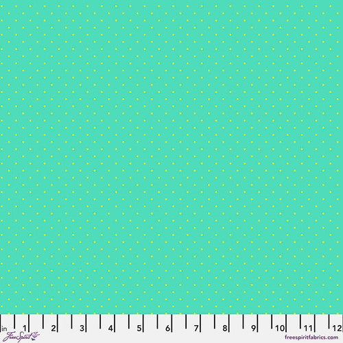 A light blue background with small white dots.