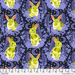 A pattern of rabbits and flowers on a dark background.