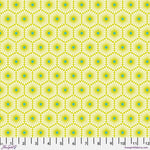 A yellow and green pattern is shown on fabric.