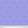 A purple background with white and red polka dots.