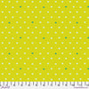 A yellow polka dot fabric with white and green dots.