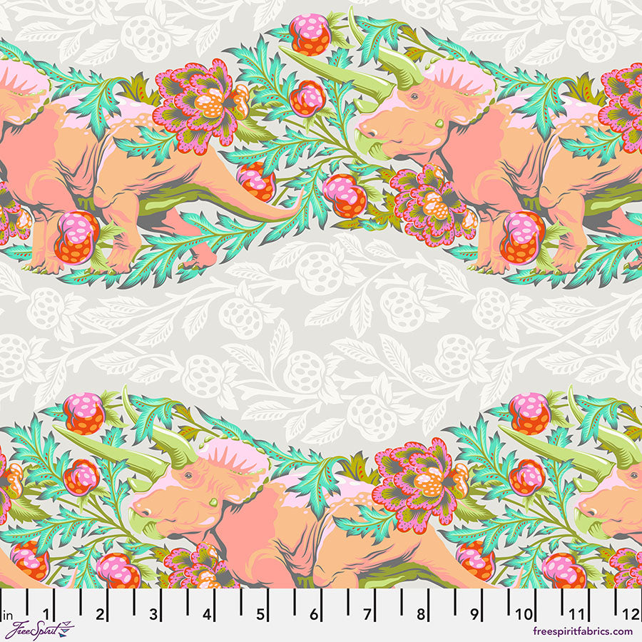 A pink and green floral pattern on the side of a white background.
