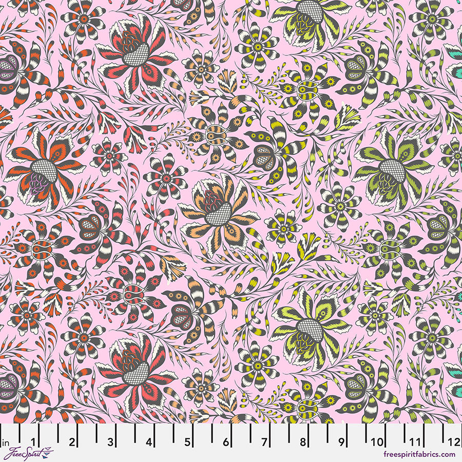 A pink floral pattern with green and red flowers.
