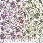A floral pattern with purple, green and white flowers.