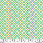 A green background with small squares and dots.