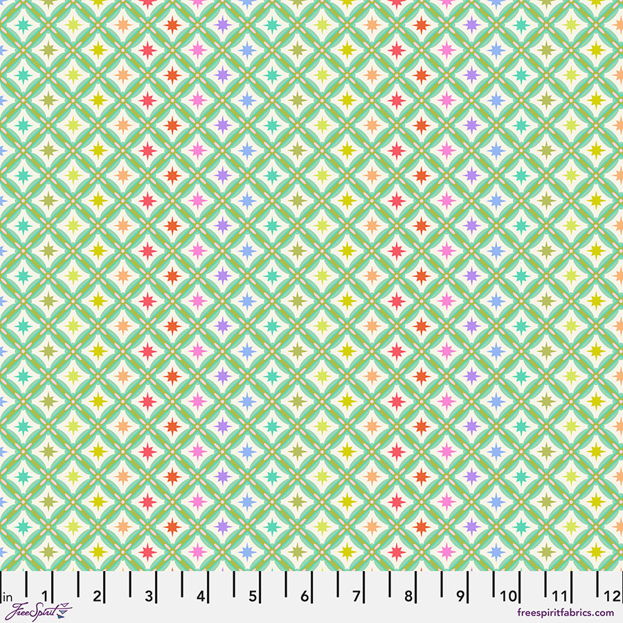 A green background with small squares and dots.