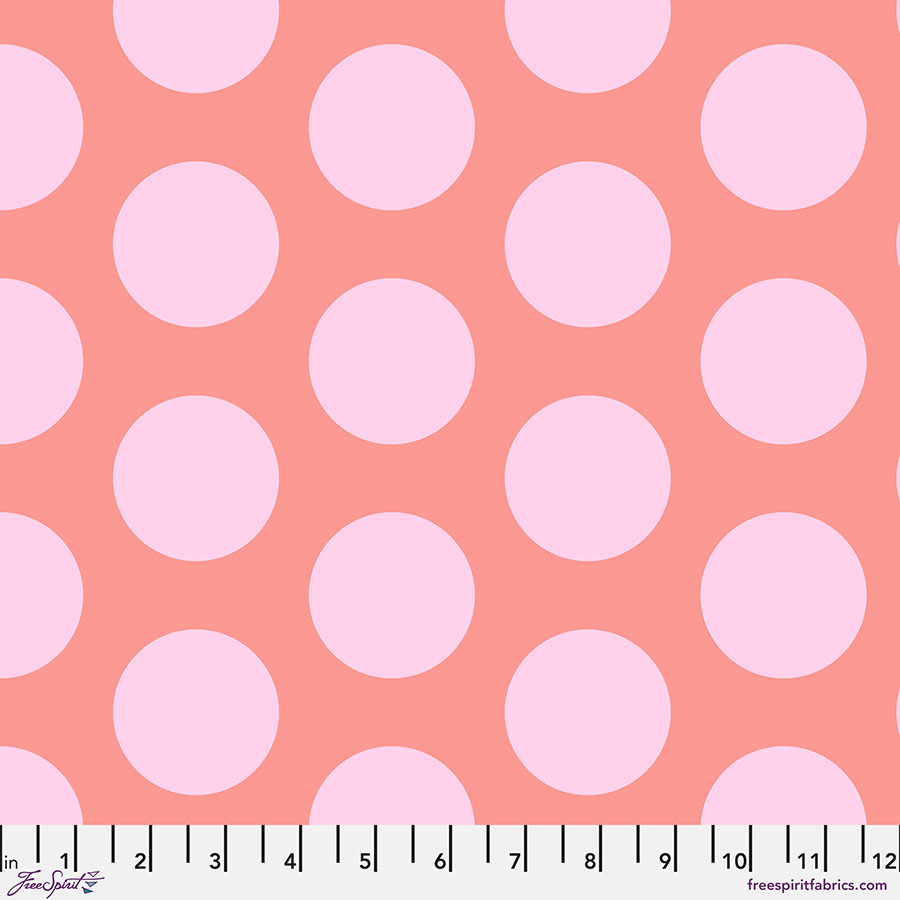 A pink polka dot fabric with white dots.
