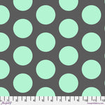 A gray and green polka dot fabric with a white background.