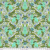 Intricate symmetrical pattern with green, blue, and beige tones.