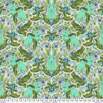 Intricate symmetrical pattern with green, blue, and beige tones.