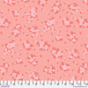 Pink fabric with small floral prints and white measuring tape.