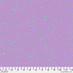 Purple fabric with small blue and green dots and a white ruler at the bottom.
