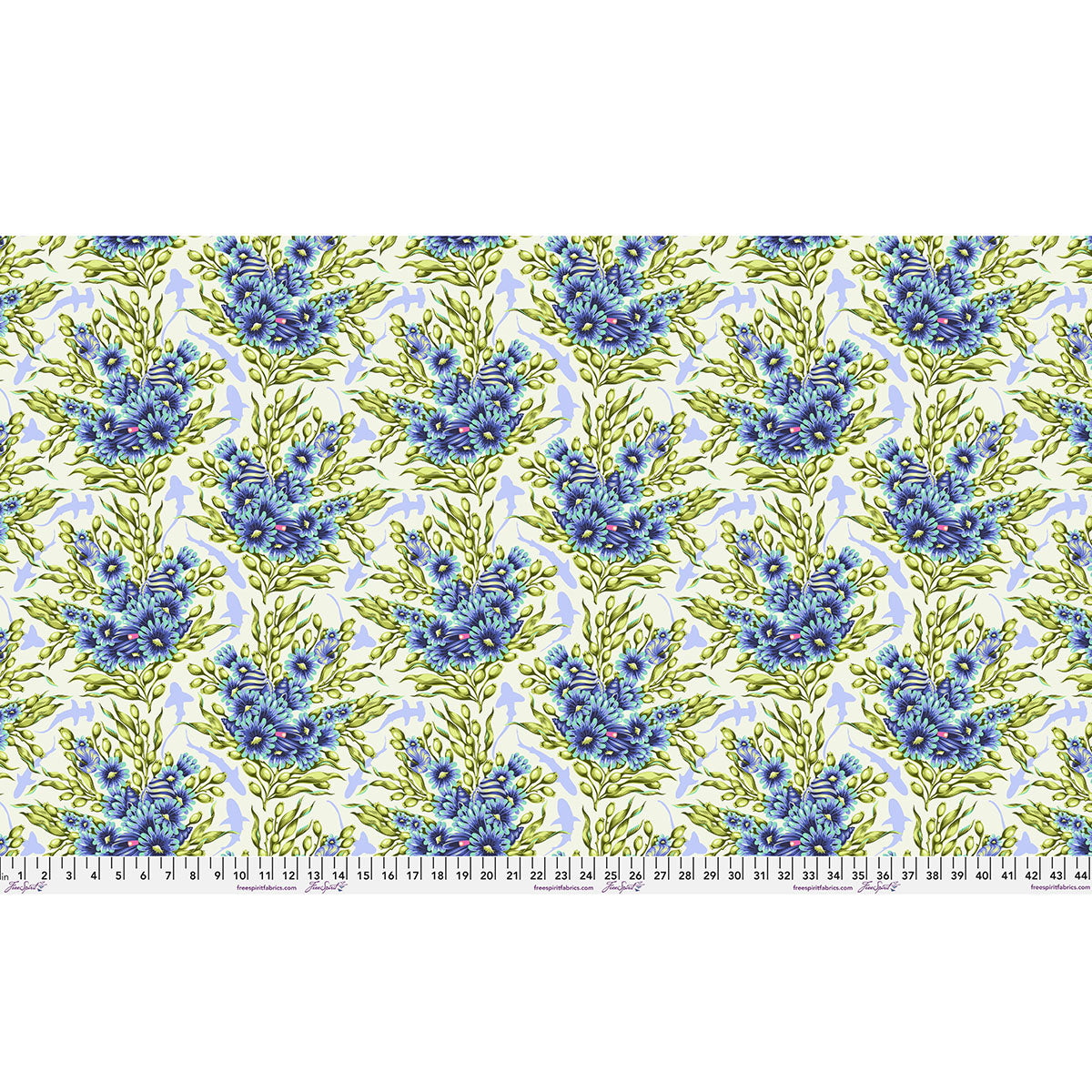 Blue and green floral pattern fabric with a ruler at the bottom.
