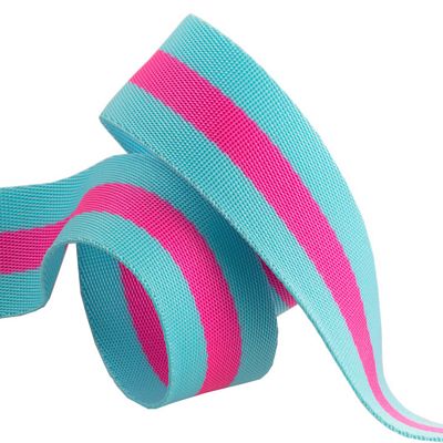A pink and blue striped ribbon is curled up.