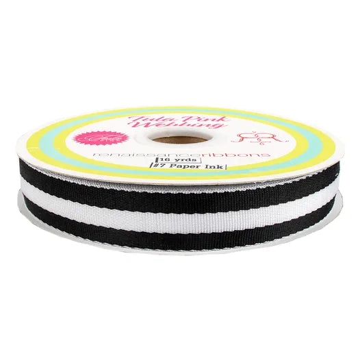 A roll of black and white ribbon.