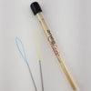 A pair of needles and a wooden stick